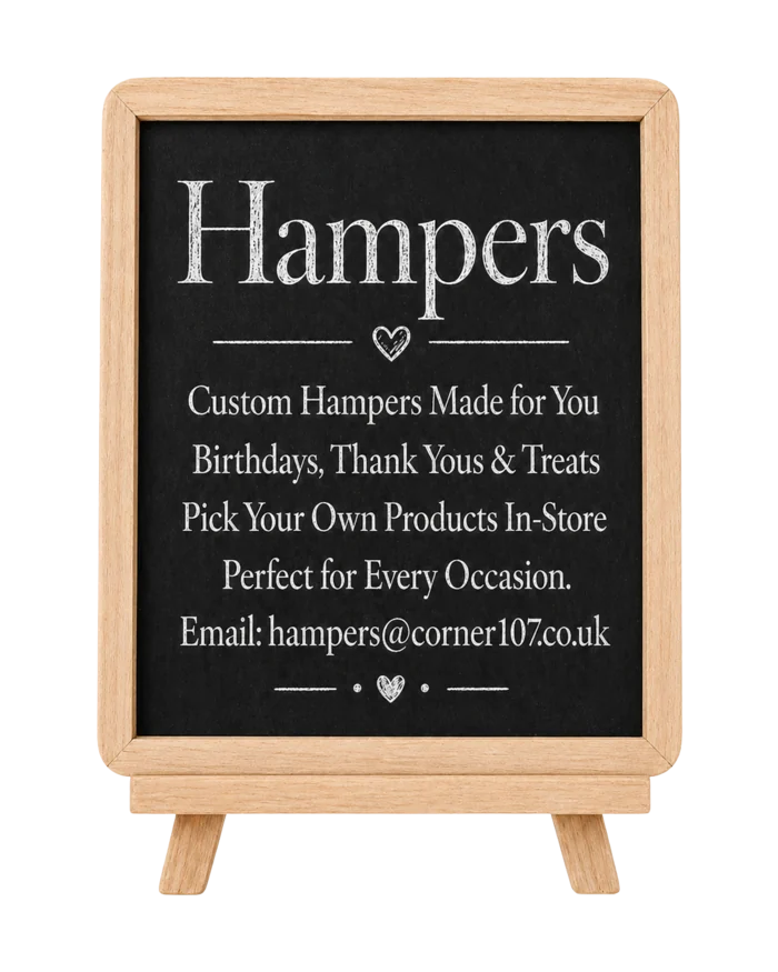 Chalkboard sign for custom Corner 107 hampers — birthdays, thank-yous and treats; pick your own products in store; email hampers@corner107.co.uk